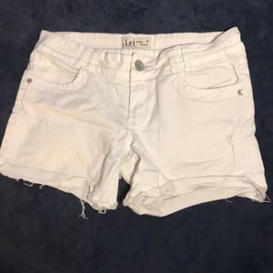 White denim cutoff shorts